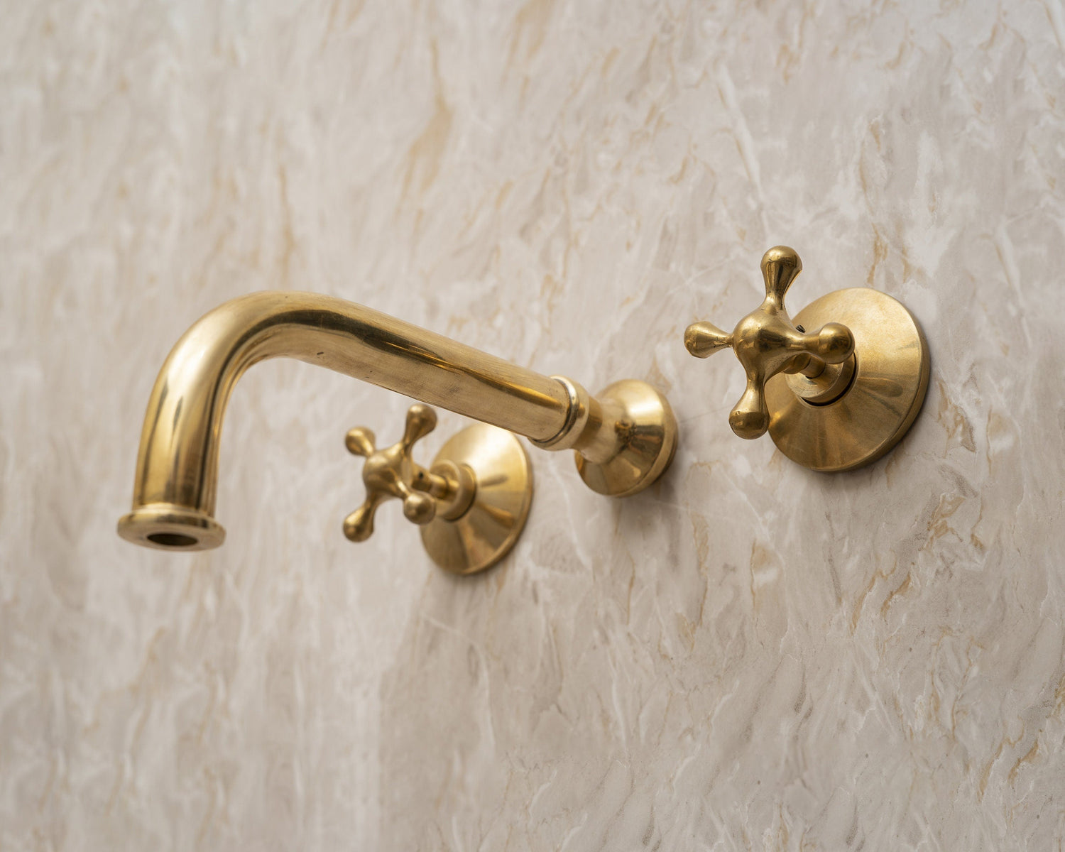 Unlacquered brass sink faucet