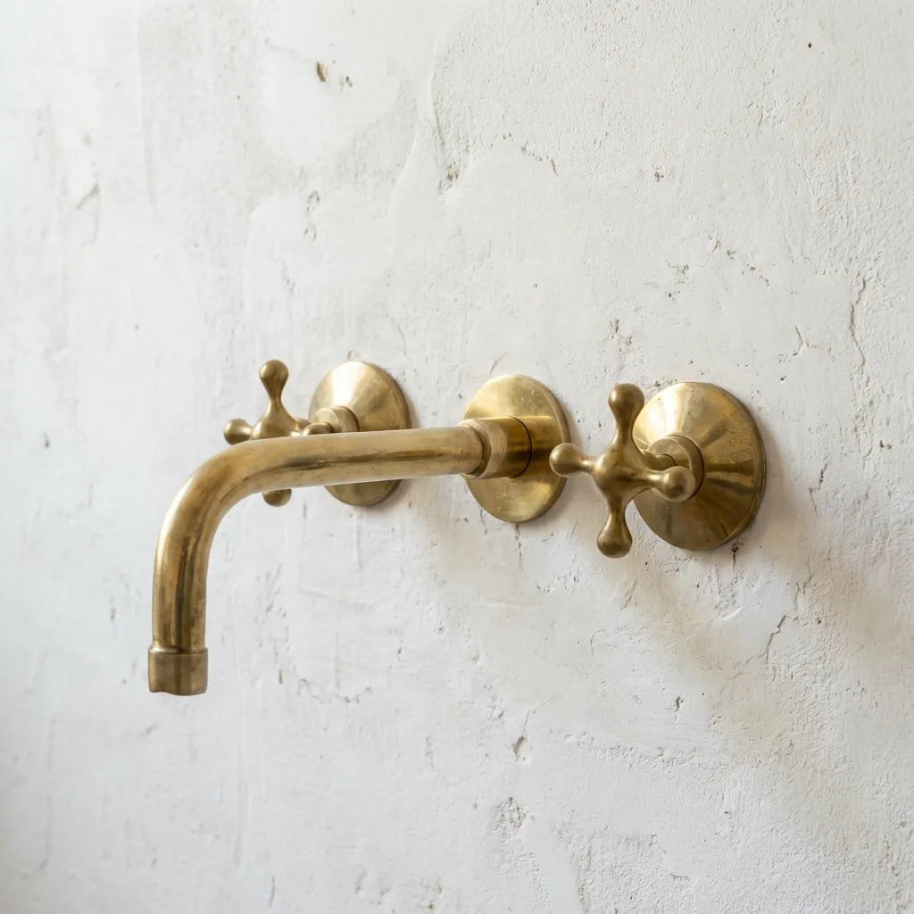 Handcrafted Three-Hole Unlacquered Brass Wall Mounted Vanity Faucet