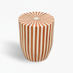 Wooden stool with sunburst pattern on a white background