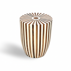 Wooden stool with striped pattern on a white background