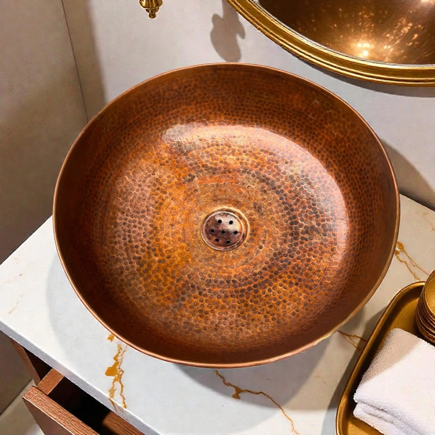 Round hammered copper vessel sink