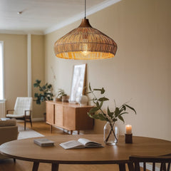 Havenly Rattan Woven Dome Pendant Light hangs over Reading Table