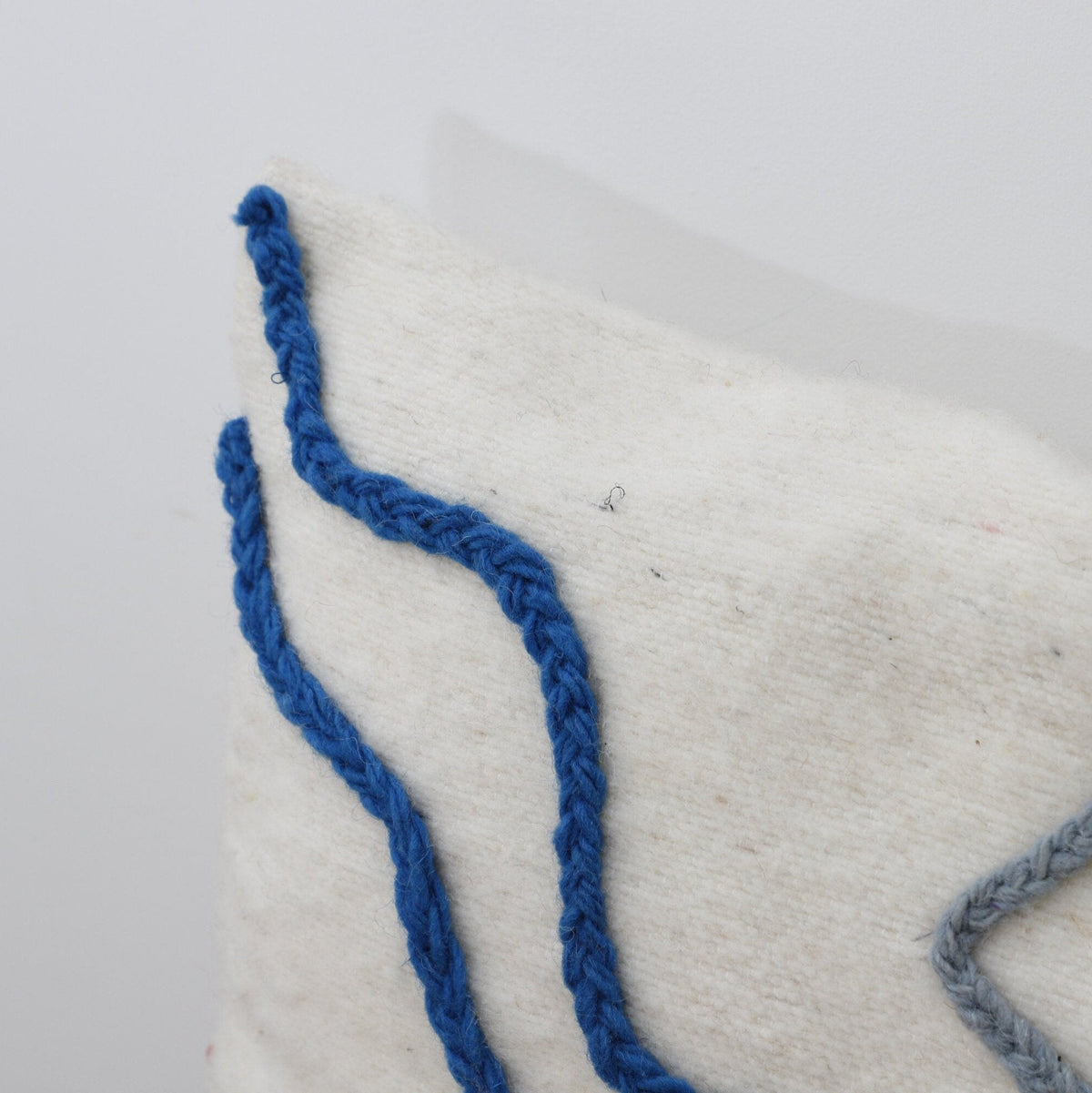 Abstract Embroidered Moroccan Pillow Cover – Handcrafted Wool Cushion in Blue & Neutral Tones