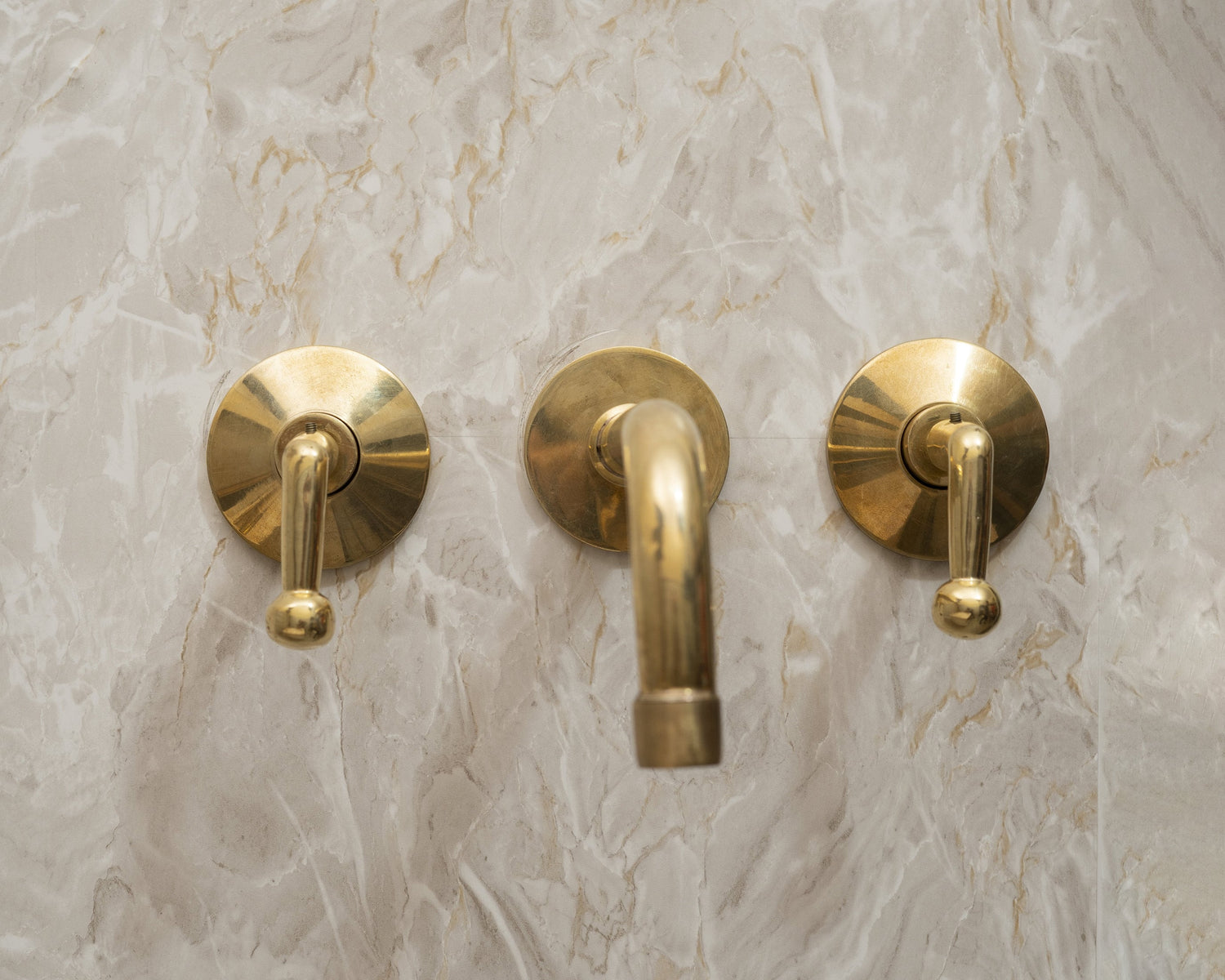 Unlacquered Brass Three Hole Bathroom Faucet with Lever Handles
