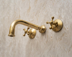 Unlacquered brass sink faucet
