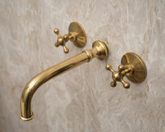 Unlacquered brass sink faucet
