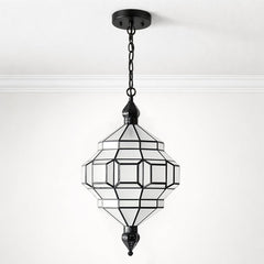 Ornate Moroccan-style pendant light with clear glass panels and a black metal geometric frame, suspended from the ceiling by a black chain