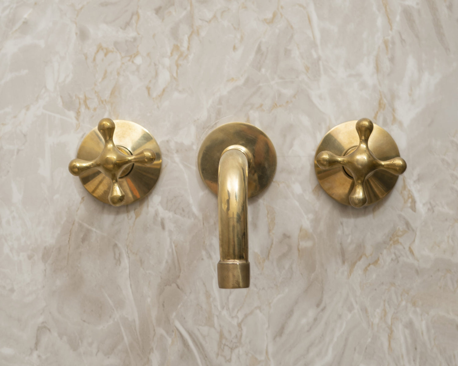 Handcrafted Three-Hole Unlacquered Brass Wall Mounted Vanity Faucet